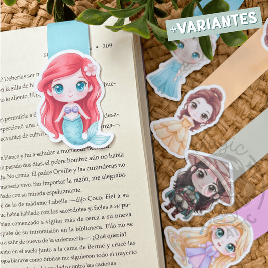 Marcapáginas imantado de princesa Disney colgado en un libro abierto